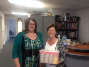Contest winner Gail Lawler receives her prize from Chief Therapist Nicki Cooke